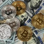 Close-up of bitcoins and US dollar bills symbolizing modern finance and cryptocurrency.